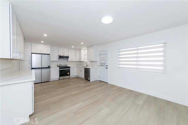 Building Photo - 16956 Denker Ave