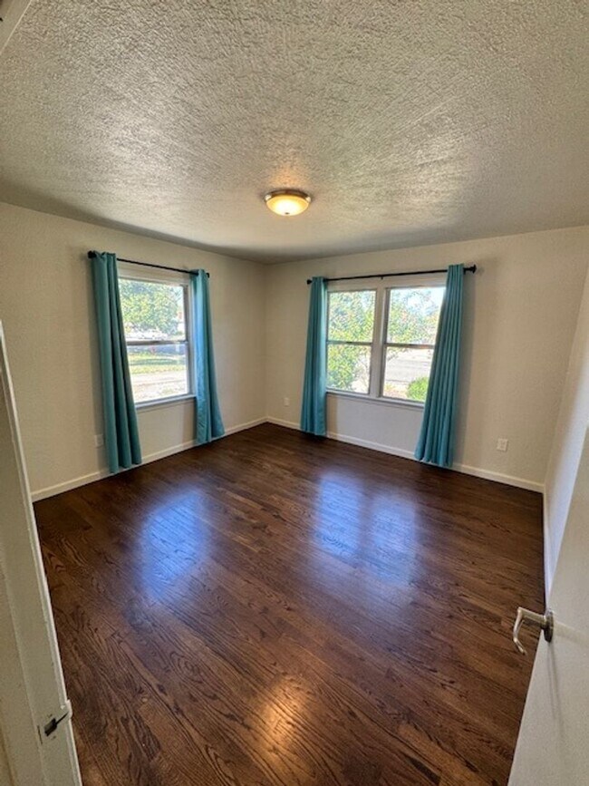 Building Photo - Charming Updated 4-Bedroom Home in the Garden Tract – Hardwood Floors, Central Air, 2-Car Garage ...