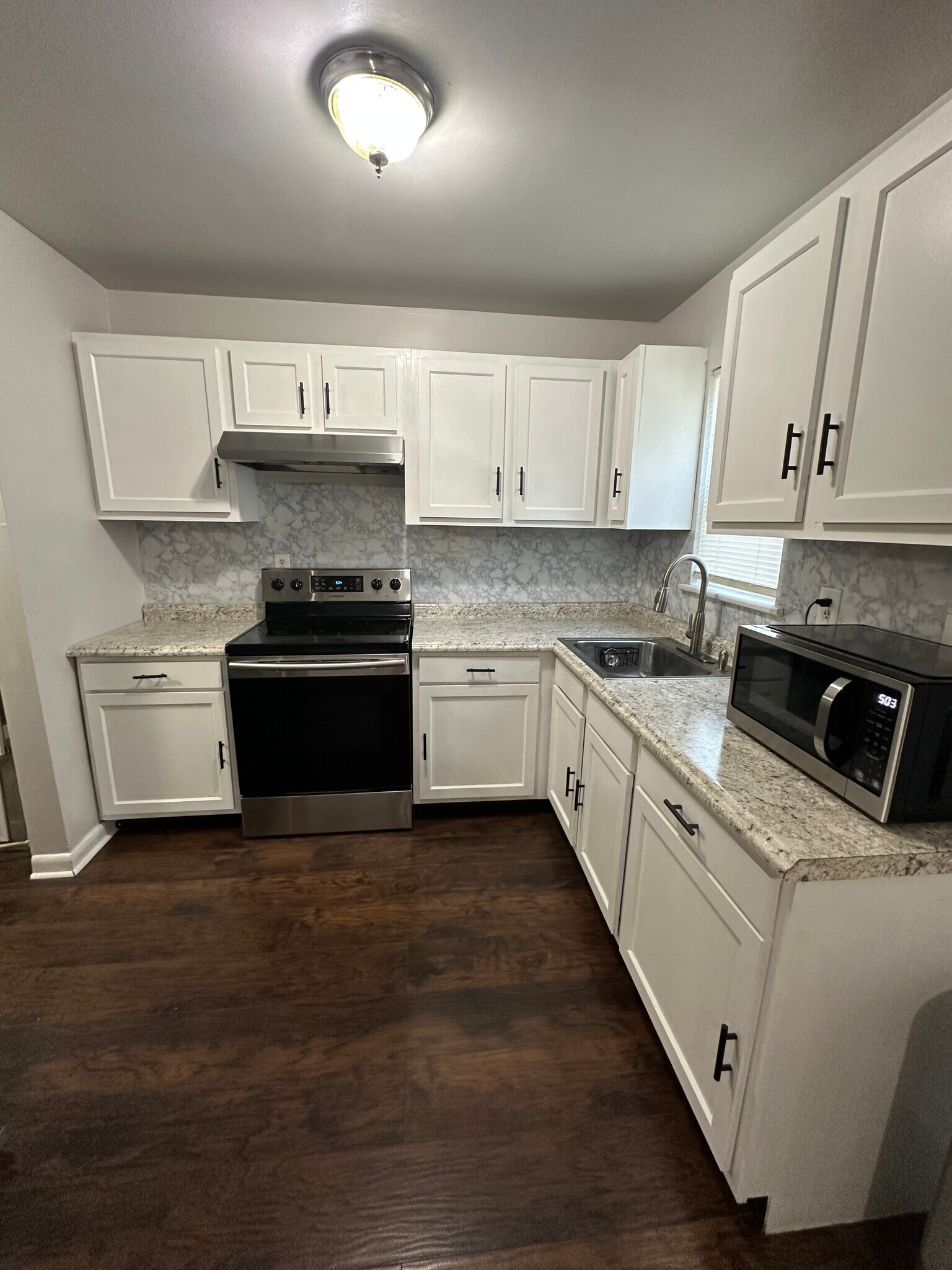 Fairly new appliances - microwave, fridge and stove - 221 Cornett St