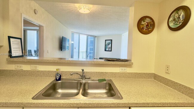 Building Photo - 17375 Collins Ave