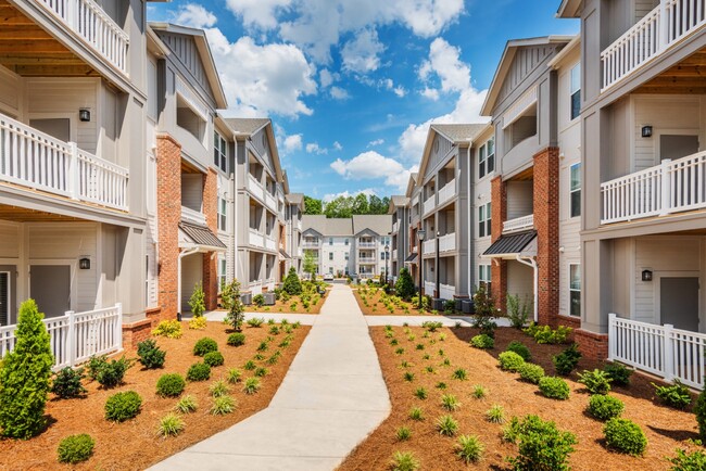 Patio or balcony available for every apartment home - Evoke Living at Sugar Creek Apartments