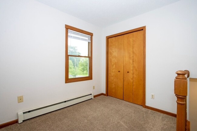 Building Photo - Three Bedroom Duplex