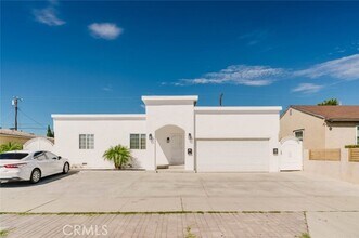 Building Photo - 7945 Woodman Ave