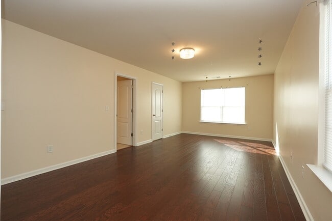 Building Photo - Modern 4BR 3.5BA w/ Updated Kitchen + Screened Porch + Wraparound Island in Bryton