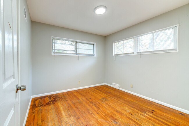 Building Photo - Charming Mid-Century Home with Basement and Fenced Backyard!