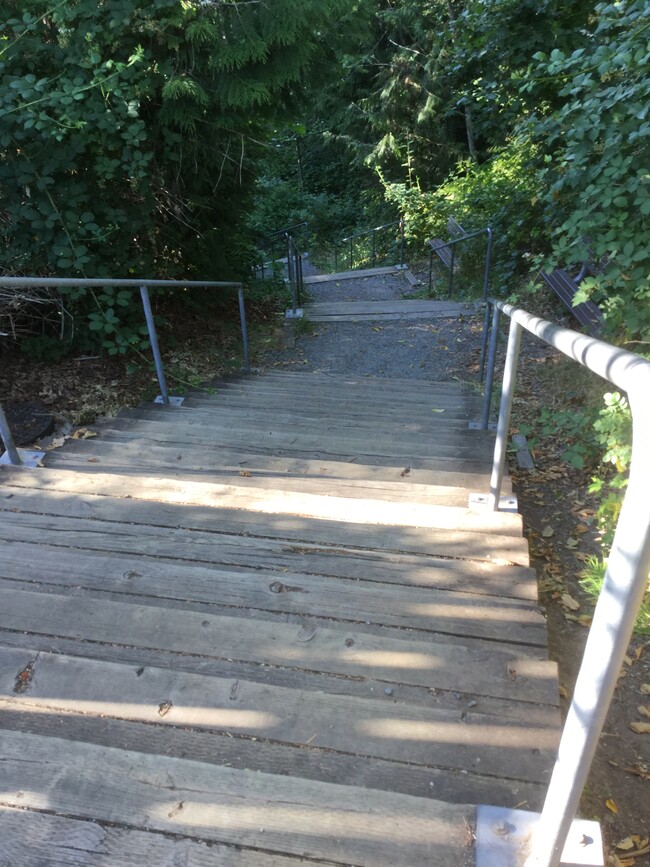 Stairs down toward apartments and Safeway, restaurants and stores. - 7905 Crown Ridge Blvd