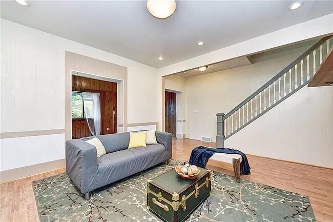 Living Room with finished front porch in the background - 4234 Lydia St
