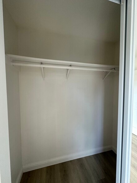 Cozy primary bedroom with natural light and fresh paint. - 721 15th St