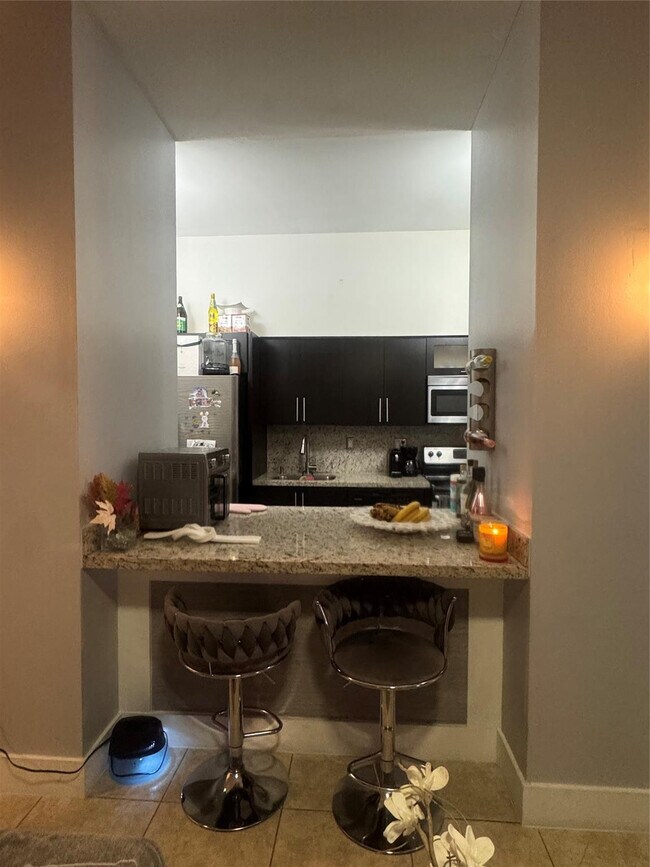 Building Photo - 7420 W 20th Ave