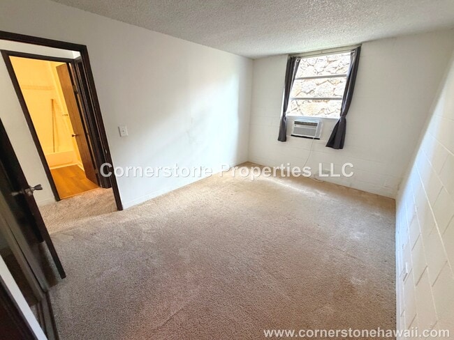 Building Photo - 98-1030-1030 Moanalua Rd