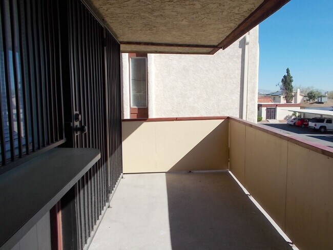 Building Photo - Charming Upstairs Condo with Private Balcony