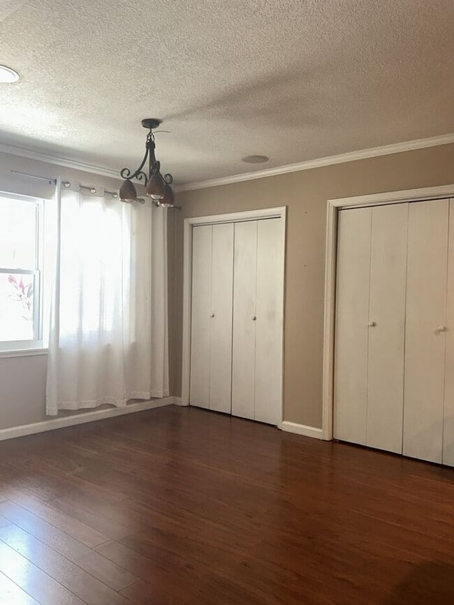 Building Photo - THE TRIAD TOWNHOMES IN CARROLLWOOD
