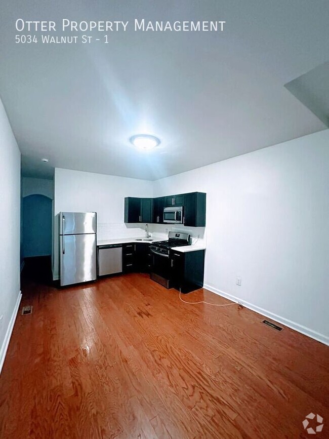 Building Photo - Charming 2BR/1BA with In-Unit Washer/Dryer...