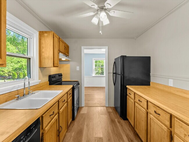 Building Photo - 7602 Woodman Rd