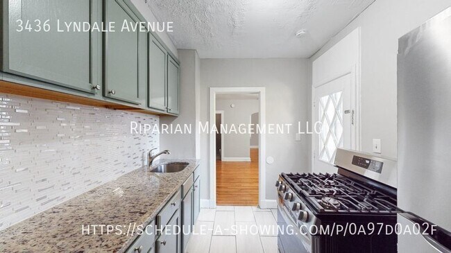 Building Photo - Fully Renovated & Fenced Backyard!