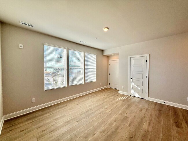 Building Photo - Stunning New Construction 2BD, 2.5BA Cary Townhome-Style Condo with a 1-Car Garage & Bonus Flex S...