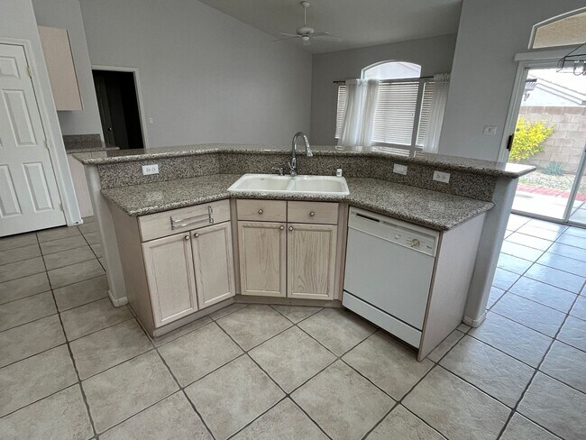 Building Photo - Lovely Gated Townhome Single Story Community.