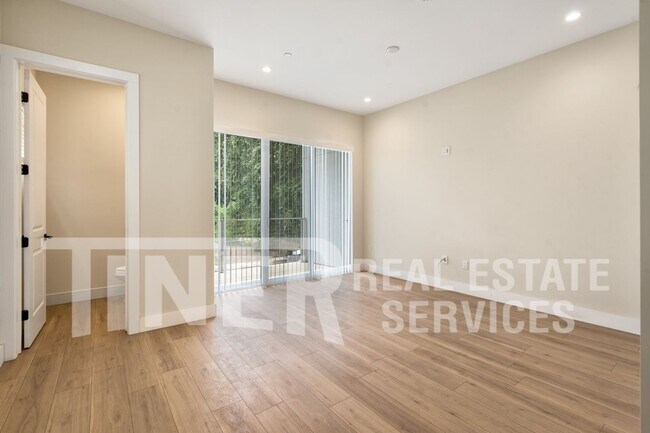 Building Photo - Elegant Modern Living