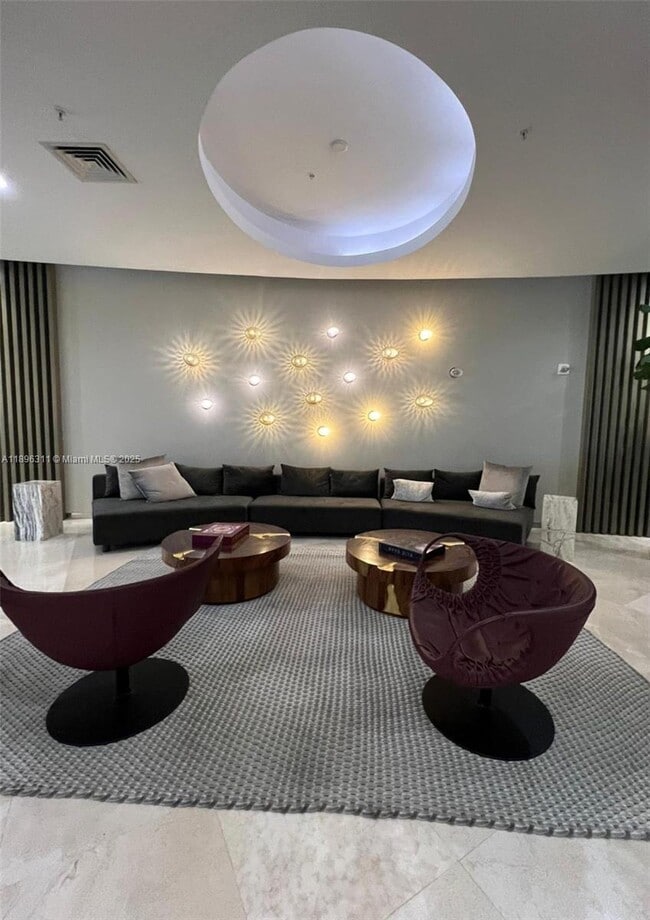 Building Photo - 10275 Collins Ave