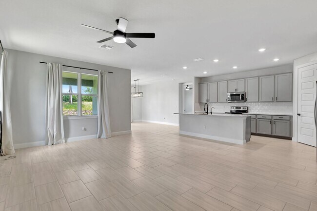Building Photo - Spacious 4BR Home in Port St. Lucie – Modern Comfort Awaits
