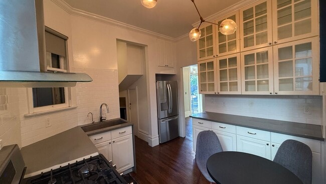 Building Photo - EPIC REA- Outstanding NOPA Location w/Garage Parking - 2 BR/1 BA Condo