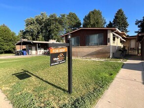 Building Photo - 4 Bedroom 2 Bath Duplex- Carport