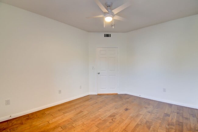 Building Photo - Gated, beautiful, and safe in a secure community