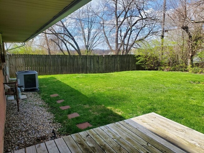 Building Photo - 4 Bedroom home with fenced in backyard and central air