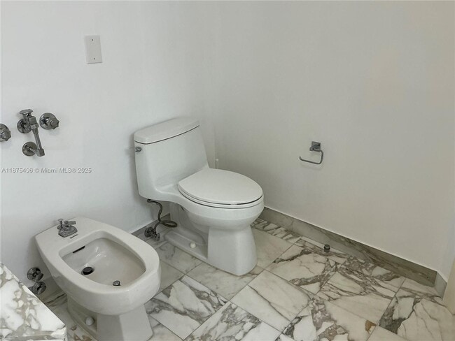 Building Photo - 10155 Collins Ave