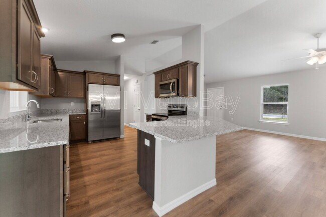 Building Photo - 9461 N Sandree Dr
