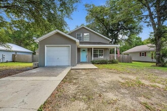 Building Photo - New rental move in ready! 4 bedrooms | 2 bathooms