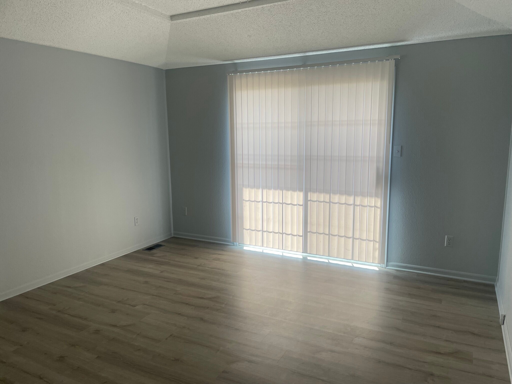 Living room with deck facing backyard - 17419 E 42nd St S