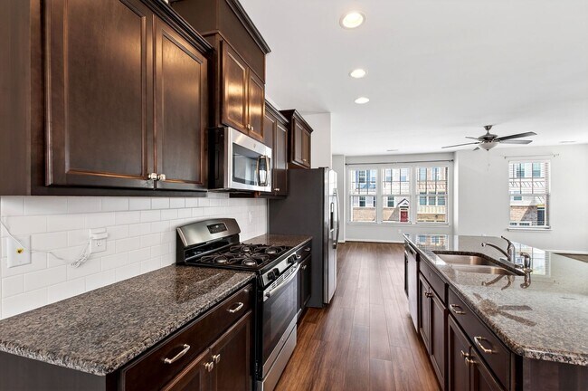 Building Photo - Beautiful 4BR End-Unit Townhome in Prime Apex Location!