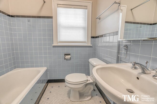 Building Photo - Updated 1928 Tutor w/ Original Touches and Large Fully Fenced Back Yard