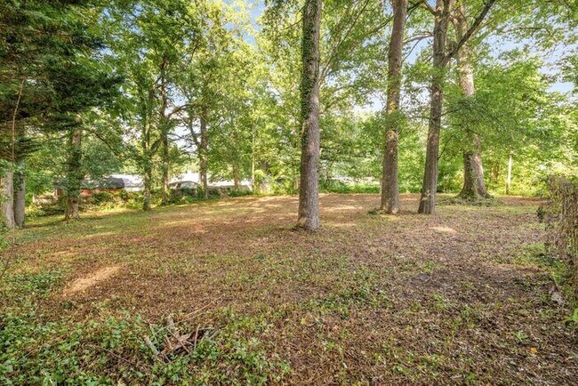 Building Photo - Adorable Home, Just Painted, Wood Flooring...