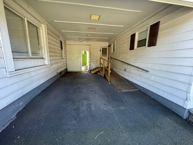 Covered parking with easy ramp access - 227 Bristol St