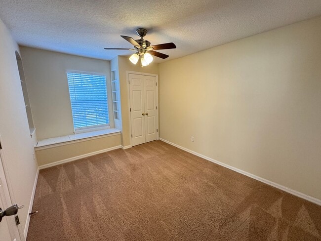 Building Photo - Spacious 4-Bedroom Home with Private Pool and Modern Comforts