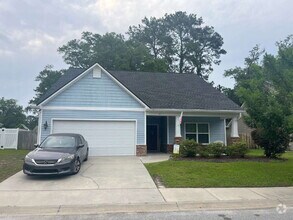 Building Photo - "Spacious 4-Bedroom Retreat with 2.5 Baths...