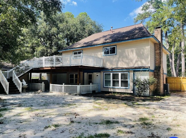 Backyard view of deck & garden area - 15231 Highsprings Dr