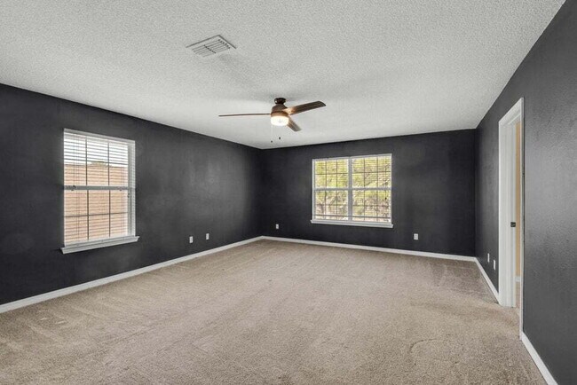 Building Photo - LAKE FRONT HOME & GATED COMMUNITY WITH COMMUNITY POOL IN NAVARRE!