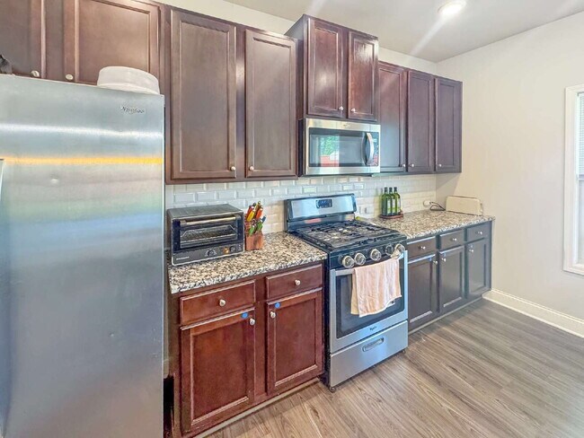 Building Photo - Beautiful 4BR Home in Mundy Mill | Corner Lot | Resort-Style Amenities
