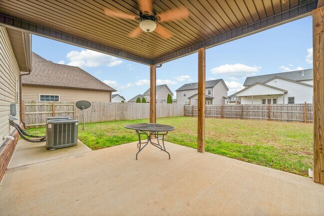 Building Photo - Four Bedroom with Three Car Garage!