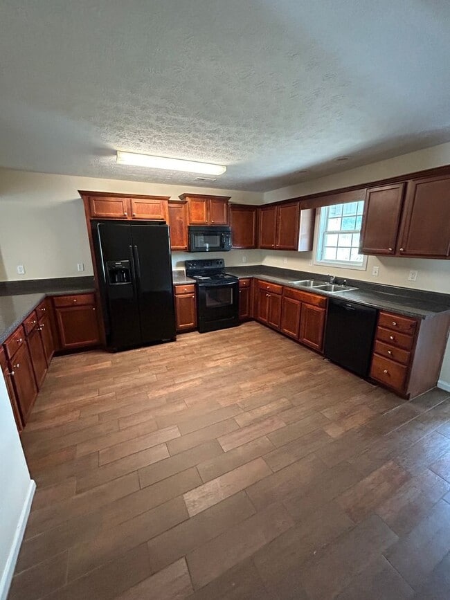 Building Photo - Talk of the Townhomes in Carrollton City School District!