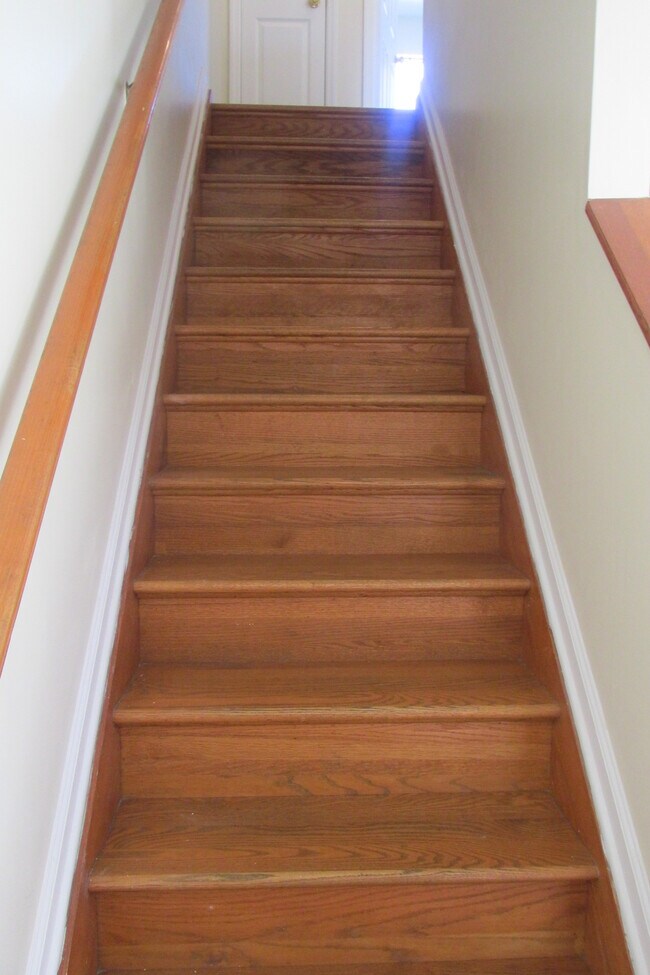 Stairs to bedrooms - 223 Deer Ridge Trail