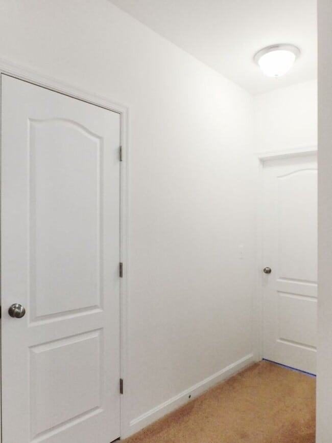 Building Photo - Pet Friendly Condo with Deck and 1 Car Garage
