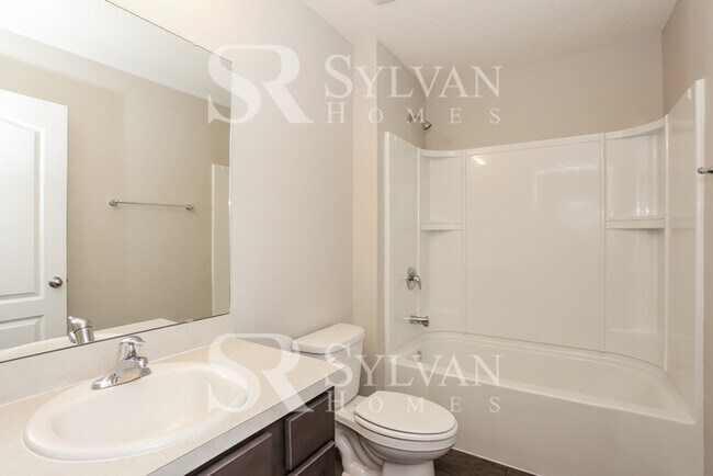 Building Photo - Turn the key. Enter. Smile. Repeat every day!