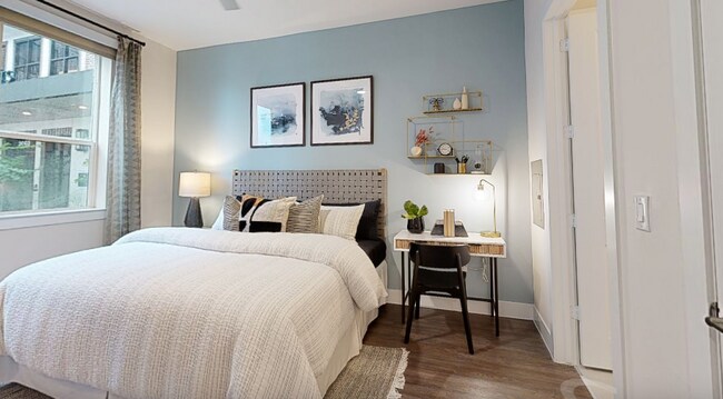 Building Photo - Making Midtown Buzz — Live in Style Today!