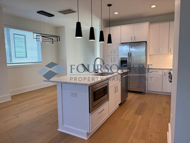 Building Photo - Spacious New Construction 4-Bed, 4-Bath Townhome with Modern Finishes, Fireplace & Fenced Yard | ...