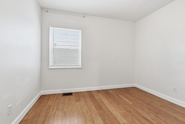 Building Photo - $3,045.95, 3 bed, 2 bath house in Denver with Fenced in Yard and In Unit Laundry!