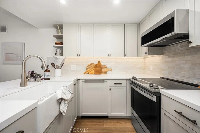 Building Photo - "Chic Marina Pacifica Retreat: 1-Bedroom G...